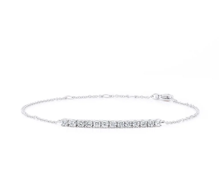 Pulsera Tennis Mini Oro Blanco 18k, con 13 Diamante brillante que suman 29 pt Largo: 18 cm