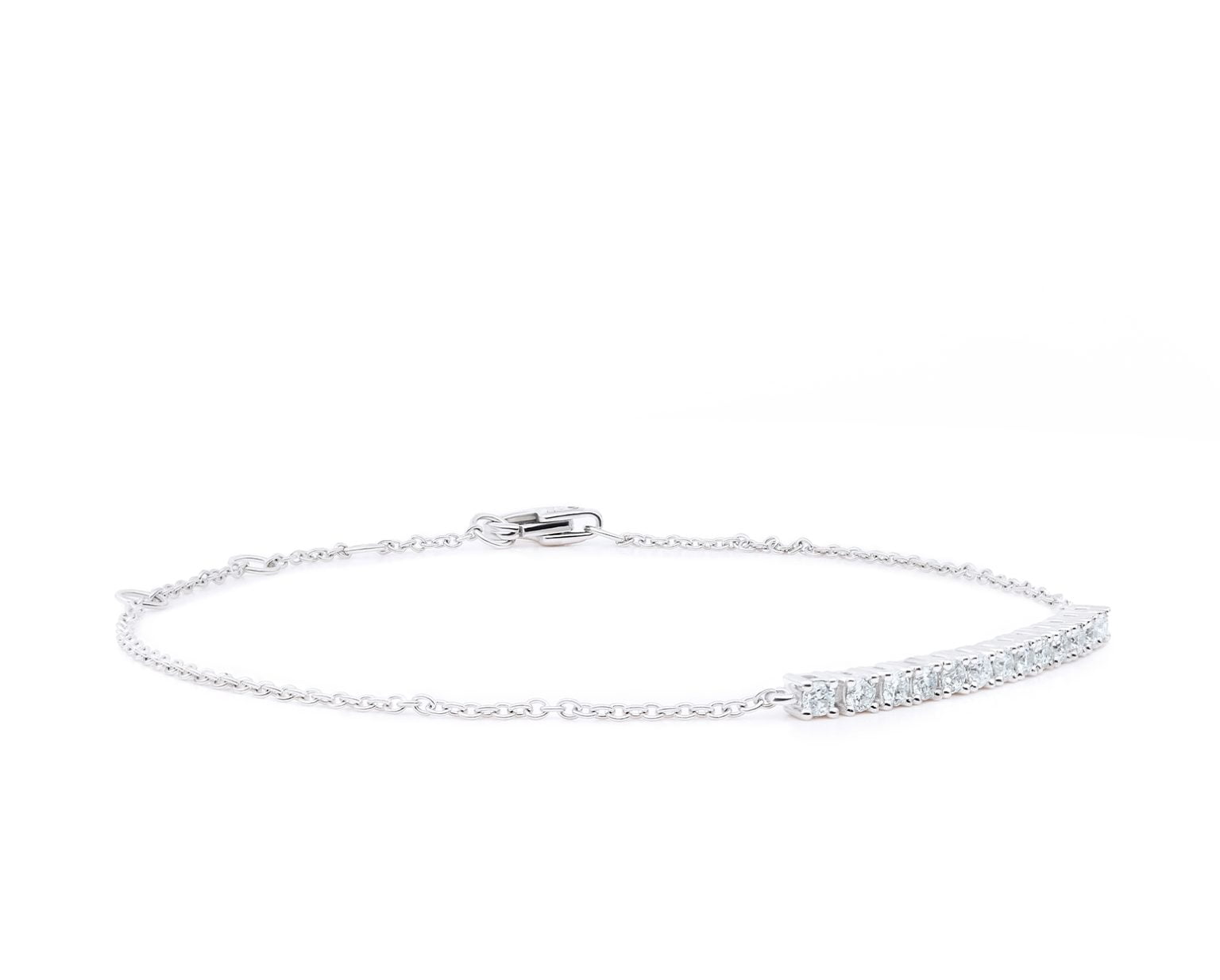 Pulsera Tennis Mini Oro Blanco 18k, con 13 Diamante brillante que suman 29 pt Largo: 18 cm