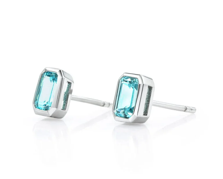 Aros Pariaba Plata fina con 2 Paraiba corte Esmeralda de 0.5 pt.